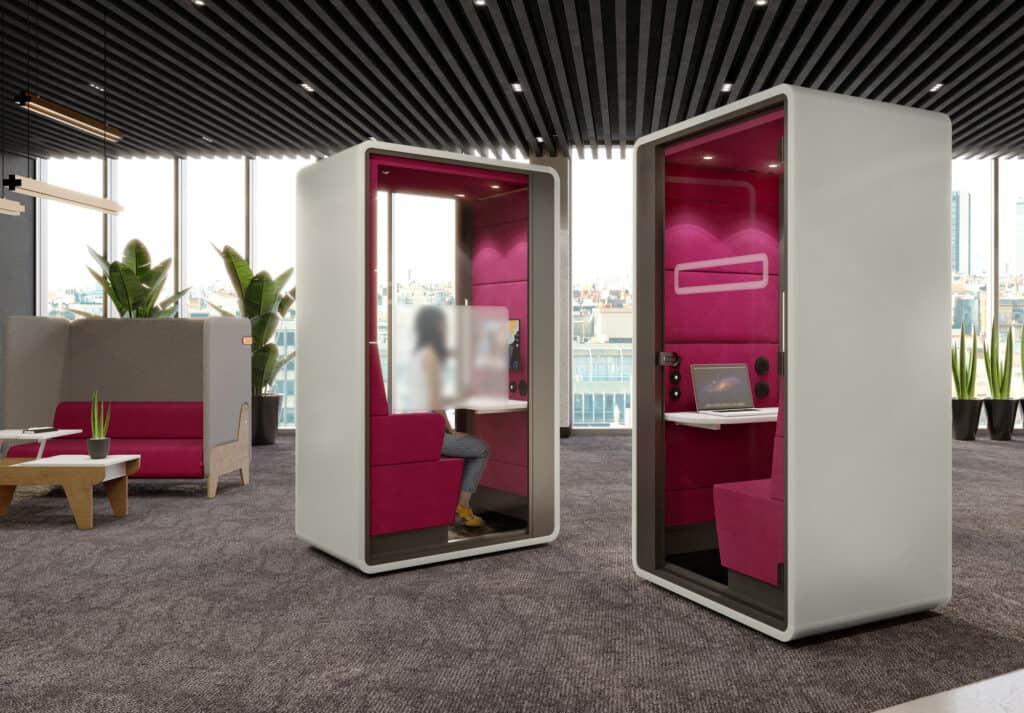 An example of agile working in an office, using privacy pods and comfortable seating in an office.